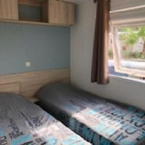 Campings Mobil home - Clim, LV, LL, TV - Camping La Carabasse '4 etoiles' - 005 : photos des chambres