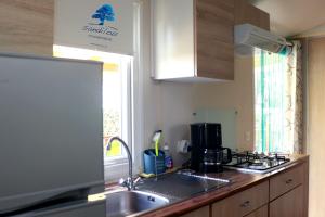 Maisons de vacances *Mobilhome «Vacances a la mer » *Mobilhome 4 personnes * Climatise : photos des chambres
