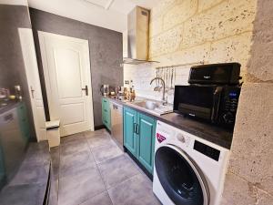 Appartements Meubles de l'Arsenal coeur de ville ! : photos des chambres