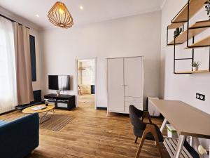 Appartements Meubles de l'Arsenal coeur de ville ! : photos des chambres