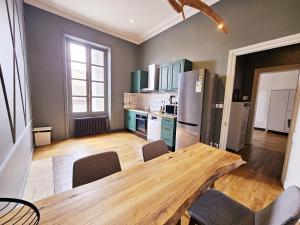 Appartements Meubles de l'Arsenal coeur de ville ! : photos des chambres