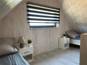 Domek całoroczny z balią 150 m Jezioro, 5 km plaża Dębki