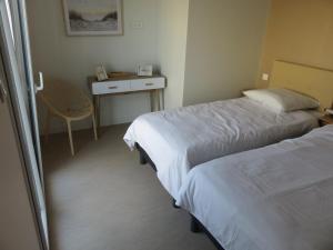 Villas 12 pers, sur la dune, PMR, spa, hammam, salle de sport : photos des chambres