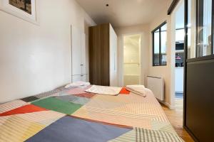 Appartements Cosy Appart Jouy N2 RER C Netflix : photos des chambres