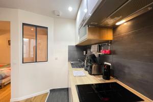 Appartements Cosy Appart Jouy N2 RER C Netflix : photos des chambres