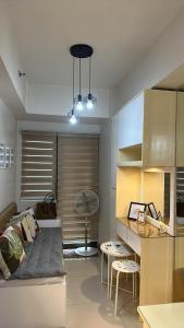 Mel and Rose Place in S Residences Tower 1 MOA