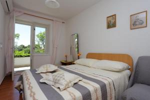 Apartments by the sea Brela, Makarska - 20598