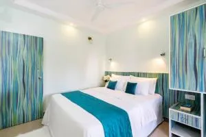 Serene Escape One Bedroom Apartment with AC, Wi-Fi, Gym and 5-Minute Walk to the Beach Cativating Tree and Garden Views - بيناوليم