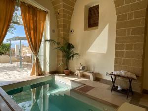 Suite with Private Pool room in Tenuta Mosè Charming house and relais