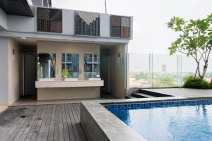 RedLiving Apartemen Evenciio - Ens Room
