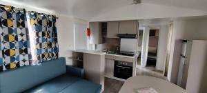 Complexes hoteliers Grand Mobil home 10 places avec 4 chambres SIBLU proche Ocean : photos des chambres