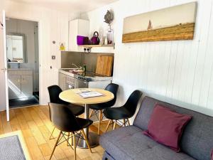 Purple CargoPod at Lee Wick Farm Cottages & Glamping