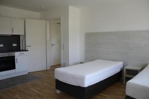 2 Zimmer Apartment mit bis zu 3 Einzelbetten in der Land of Living
