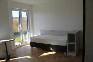 2 Zimmer Apartment mit bis zu 3 Einzelbetten in der Land of Living