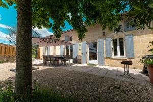 Maisons de vacances L Escale des Vignes GITE proche Saint Emilion Chateau Beynat : photos des chambres