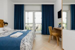 Business Apartments Kasprzaka with Parking by Noclegi Renters