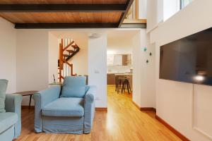 GuestHost - SantAmbrogio Design Apartment