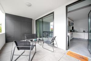 Appartements T3 Terrasse + parking - proche Aeroport et MEET : photos des chambres