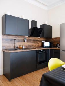 Appartements Luxe Poincare : photos des chambres