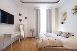 Appartements Luxe Poincare : photos des chambres