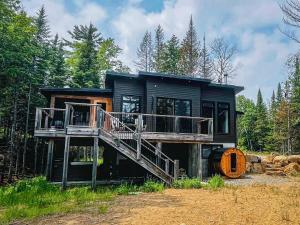 Le Grand Duc- SPA- Kayaks- bord Rivière Noire- VTT- Motoneige- Randonnée