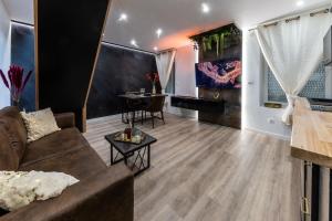 Appartements Le Vulcano : duplex lounge ! : photos des chambres