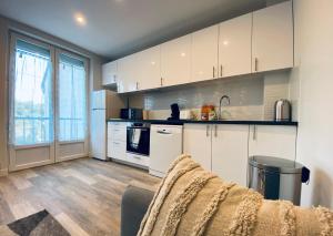 Appartements Cozy appart' a deux pas de la gare - Cozy Houses : photos des chambres