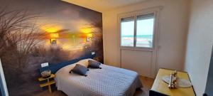 Appartements Palmier bleu front de mer : photos des chambres