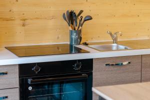 Chalets Le Laponya - Chalet avec SPA - Parking 7KW : photos des chambres