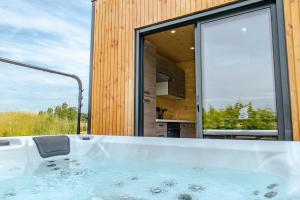 Chalets Le Laponya - Chalet avec SPA - Parking 7KW : photos des chambres