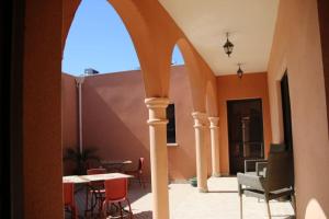 Chambre Meknes, Riad 7 au village naturiste Couple only