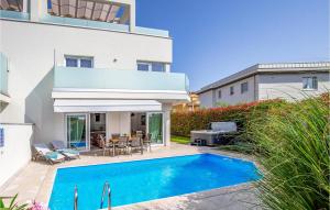 Amazing Home In Premantura With Outdoor Swimming Pool