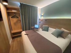 Hotels Kyriad Montpellier Sud - A709 : photos des chambres