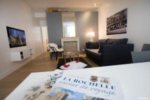 Appartements L'Appartement : location les merciers. : photos des chambres