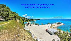 A - luxury apt w big balcony 4 min walk to beach