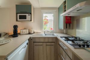 Mobil Home les pieds dans leau