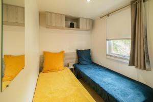 Appartements Mobil Home les pieds dans l'eau : photos des chambres