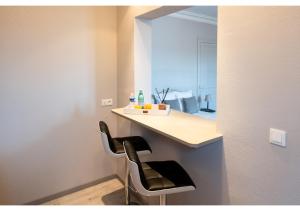 Appartements L'haussmannien, hyper centre 2 min a pied : photos des chambres