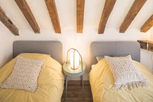 Appartements Le Rooftop - vue Cathedrale - Climatisation : photos des chambres