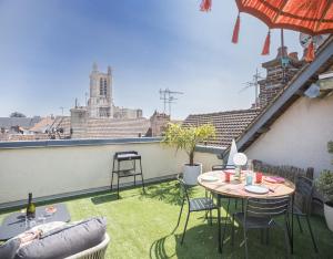 Appartements Le Rooftop - vue Cathedrale - Climatisation : photos des chambres