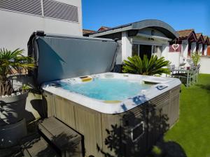 Appartements L'OASIS - Loft standing - Terrasse Rooftop - Jacuzzi Spa - Parking : photos des chambres