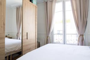 Appartements Exige Home - Bel Appartement Boulogne centre / 10 min parc des Princes : photos des chambres