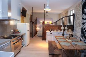 Appartements 'Le Loft des Antiquaires', Isle-sur-Sorgue : photos des chambres