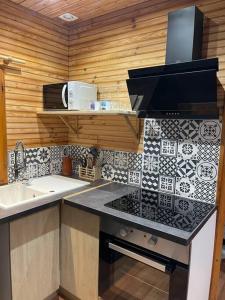 Romantique chalet avec sauna et jacuzzi extérieur