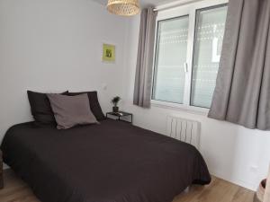 Appartements Le 4.01 proche centre : photos des chambres
