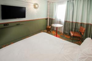 Hotels Hotel Ibis styles Lisieux ex Mercure : photos des chambres