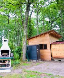 Chalets Tiny House dans les bois a 10 minutes de l'ocean : photos des chambres