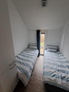 Das Holland Beachhouse, modern eingerichtet, in schöner Lage am Veluwemeer, inklusive Garten, Terrasse am Wasser, Parkplatz und WLAN