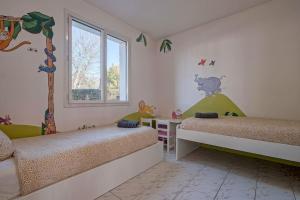 Villas Villa Paris Garden - 15 minutes de Disneyland Paris : photos des chambres