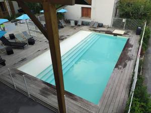 Appartements TY MOUTCHIC : Agreable appartement avec piscine : photos des chambres